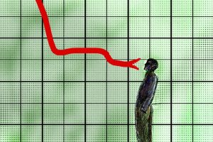 Man facing threatening snake on descending graph